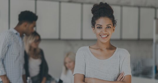 woman looks into camera it jobs timetoact group